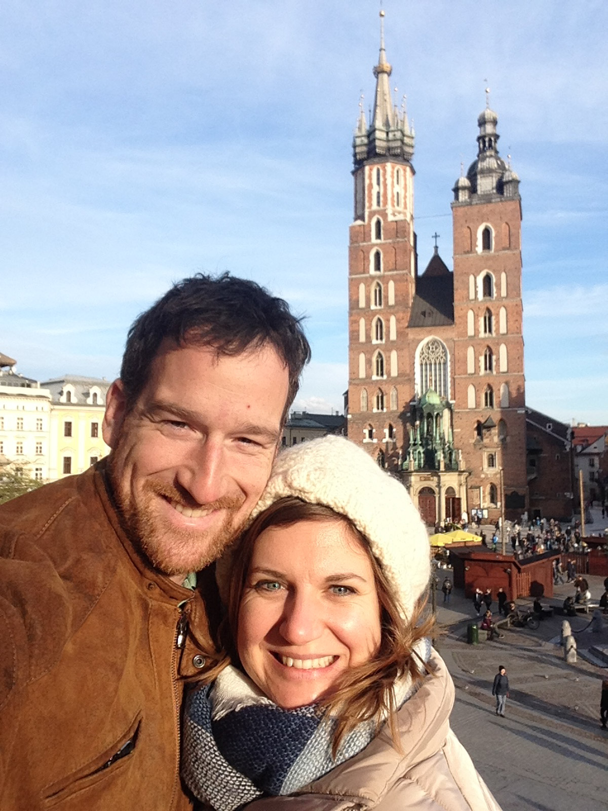 Peter and Erin in front of St. Mary's Basilica in Kraków's Main Market Square